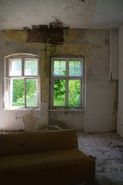 istock Interior of damaged house 690428724