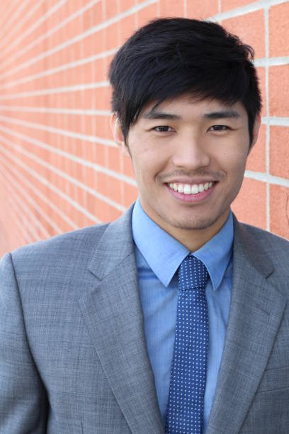 istock Confident modern business man smiling and laughing 690428822