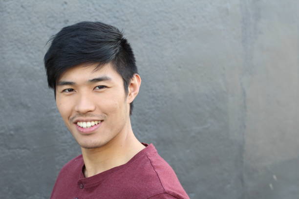 istock Asian Man Portrait Smiling Isolated with CopySpace 690428902