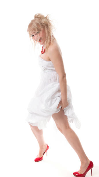 istock Beautiful fifty year old model posing in studio 690431786