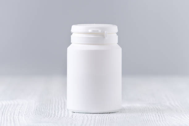istock mock up plastic bottle for medicine, powder, pills, tabs, capsules, selective focus 690436648