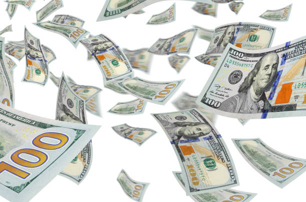 istock Cash flow - hundred dollar bills in the air. 690440840