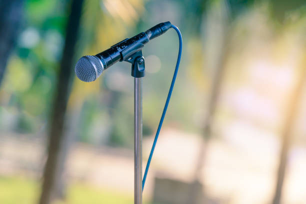 istock Black color microphone in outdoor events. 690444092