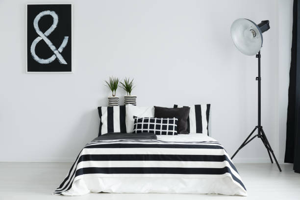 istock Bedroom with bed and lamp 690445082