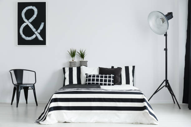istock Bedroom with chair and lamp 690445090