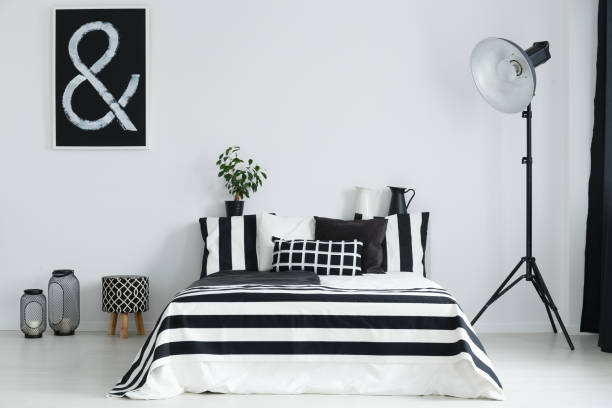 istock Bedroom with bed and decorations 690445116