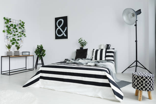istock Bedroom with plants and lamp 690445154
