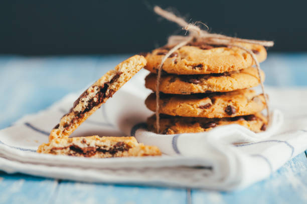 istock Chocolate chip cookies on wooden table 690456020