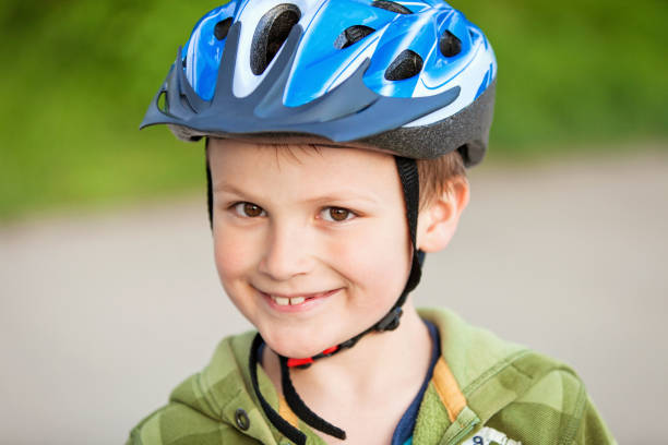 istock Happy Boy Wearing a Helmet 690482756