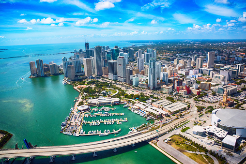 The beautiful cityscape of Miami, Florida along the Biscayne Bay shot from an altitude of about 600 feet over the bay.