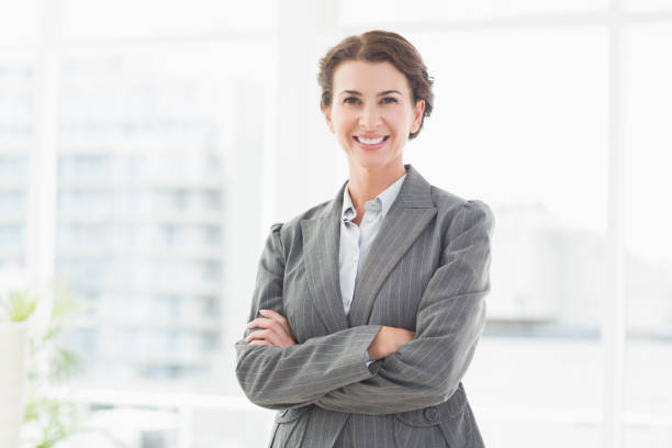 istock Smiling businesswoman looking at camera 690492626