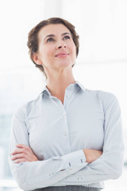 istock Thoughtful businesswoman looking away 690493006
