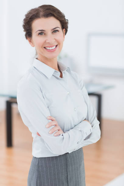 istock Smiling businesswoman looking at camera 690493202