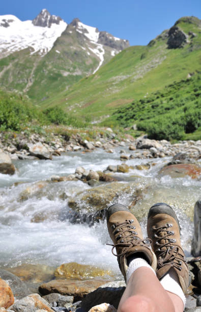 istock relaxing in front of a river 690496656