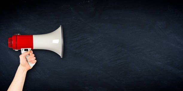 istock wide megaphone blackboard business background 690508222