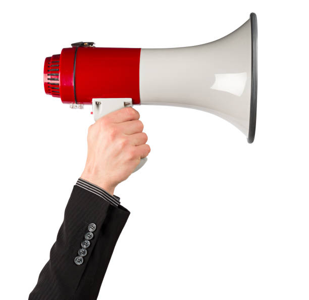 istock business  hand with red white bullhorn megaphone 690508268