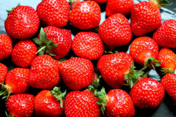 istock Strawberries on the desk backround. 690508520
