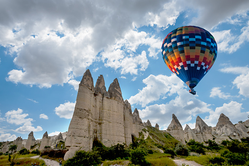 Hot air balloon flying over Cappadocia region, Turkey