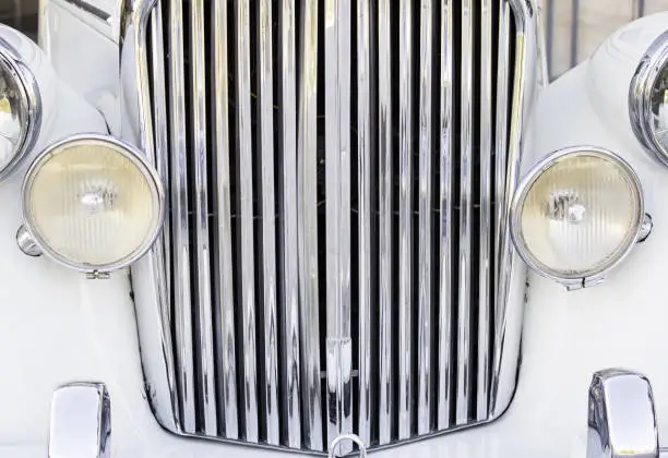 Rolls royce white and shiny wedding car