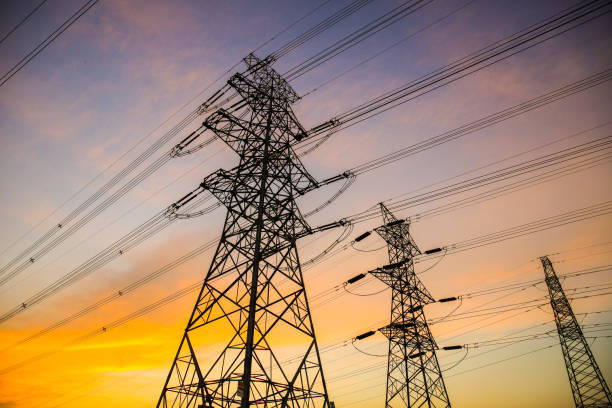 istock Electric power lines at sunset 690518522