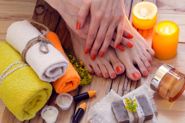 istock hands and feet spa treatment 690518946