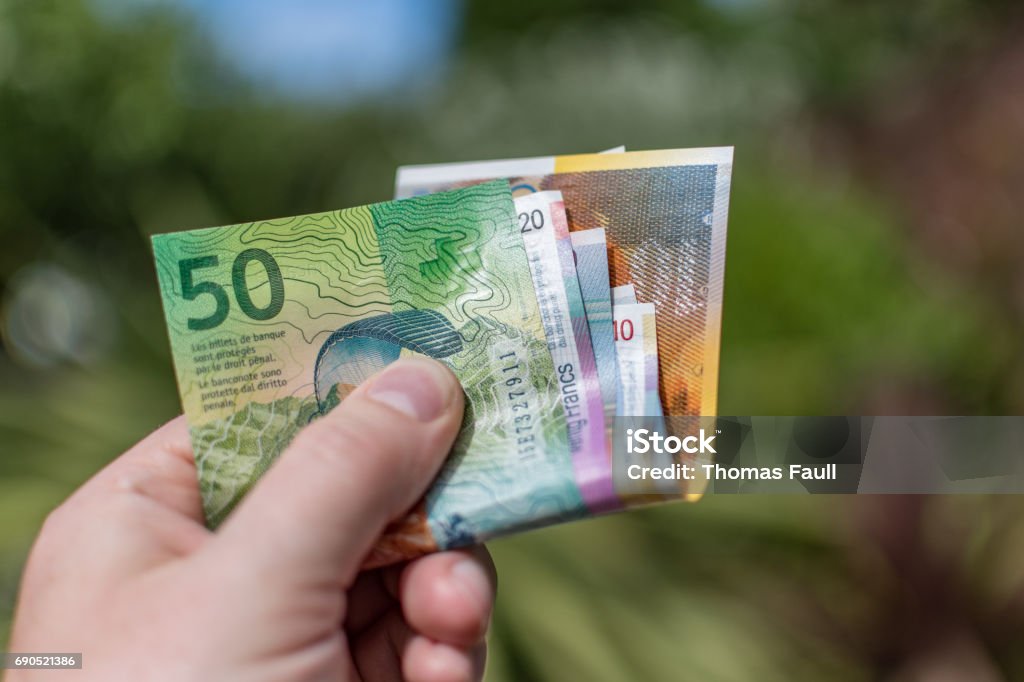 Swiss Francs (CHF) paper currency outdoors Swiss Francs (CHF) Swiss Currency Stock Photo