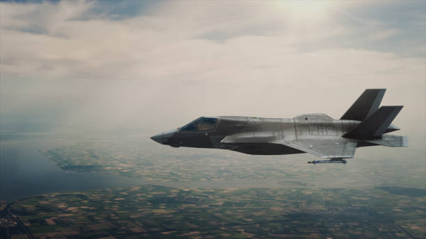 istock View of a fighter jet above the clouds 690522054