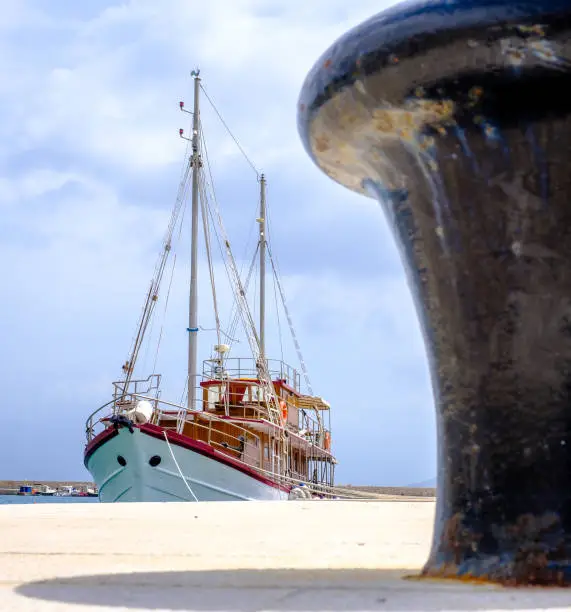 old two-master at a harbor