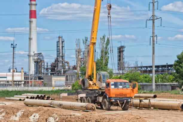 istock Welding on large diameter pipeline with  use of crane 690531854