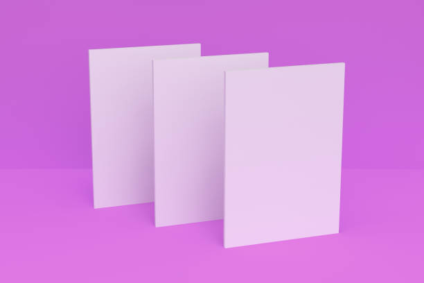 istock Three blank white closed brochure mock-up on violet background 690531950