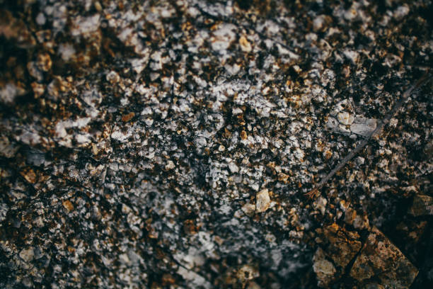 Macro view of rusted stone.  Abstract rock texture and background for designers.