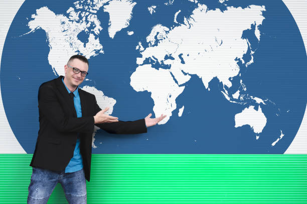 istock man or a business man showing world map with hands 690542512