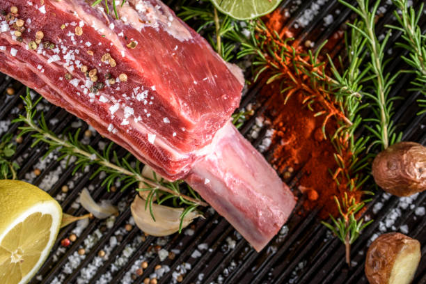 istock Raw Large Short Ribs with salt and spices top view 690542624