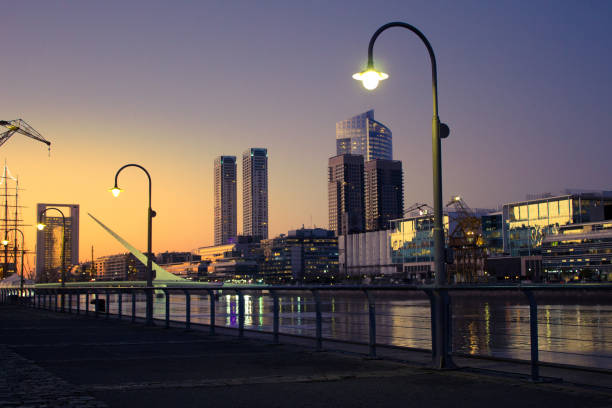 Beautiful sunset with buildings in background, Puerto Madero, Buenos Aires, Argentina. stock photo