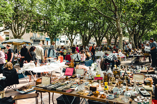 Auriol, Bouches-du-Rhône, France - May 14, 2017: Flea market, merchants display curiosities and vintage for sale.