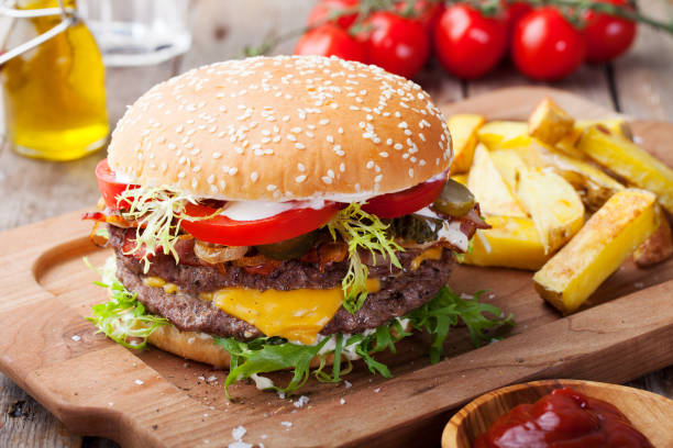 istock Burger, hamburger with french fries Cutting board. 690554812