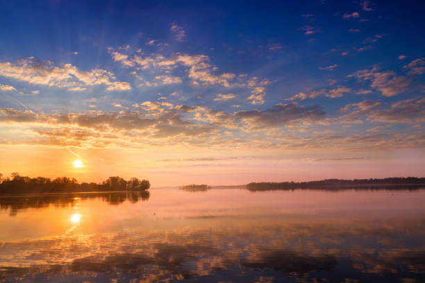 istock Sunrise over the Lake Selment Wielki 690570162