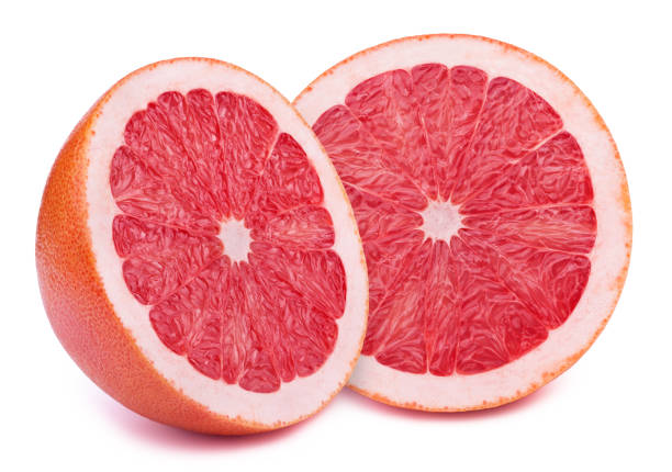 istock Halves of grapefruits isolated 690576442