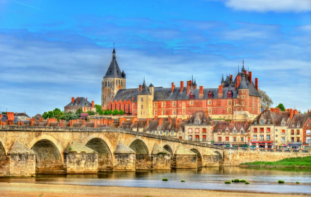 View of Gien with the castle and the bridge across the Loire - France stock photo