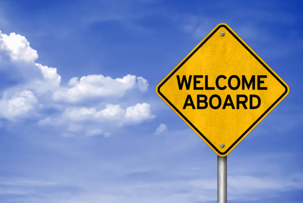 WELCOME ABOARD - road sign concept stock photo