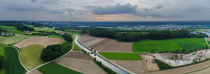 Aerial  view of the Alzcanal in Bavaria Germany near Burghausen an der Salzach. The little town Burgkirchen is in the Background.