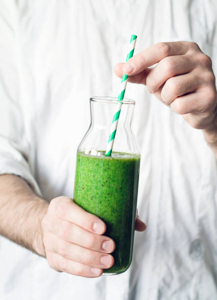 istock Green smoothie in bottle 690611060