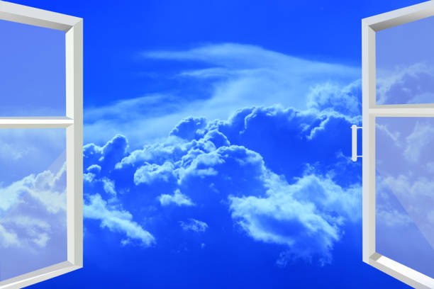 istock window opened to picturesque white clouds 690617778