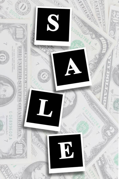 istock word sale on the dollars background 690620792