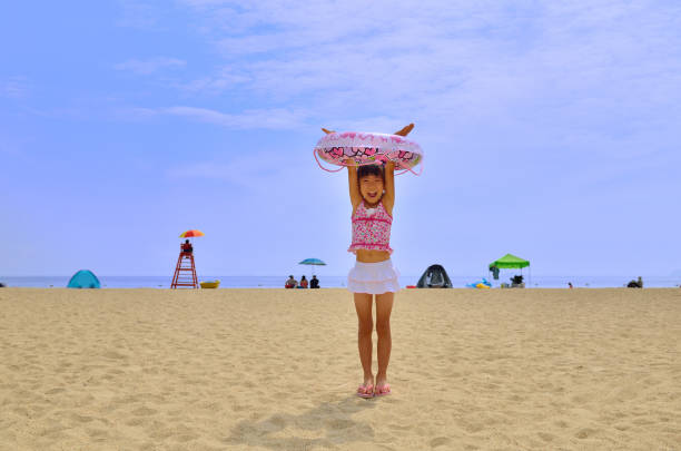 Adorable Little Girl Enjoy The Sandy Valencia Beach