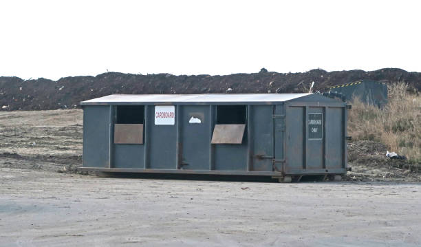 istock Community waste managent and recycle site for cardboard 690632850