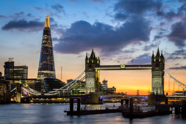istock Tower Bridge with reflections at sunset in London, UK. 690635924