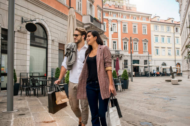istock beautiful couple in shopping 690636146