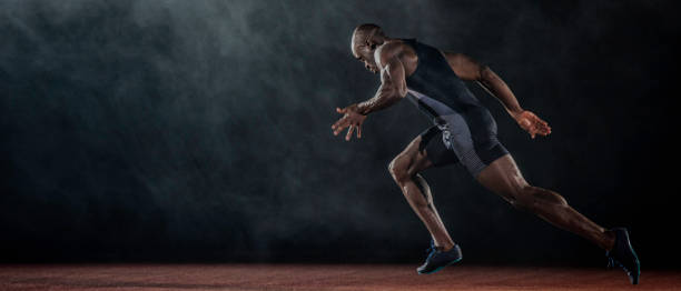 istock Side view of an African American runner 690650900