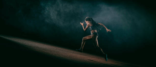 istock Side view of African-American female runner 690651310